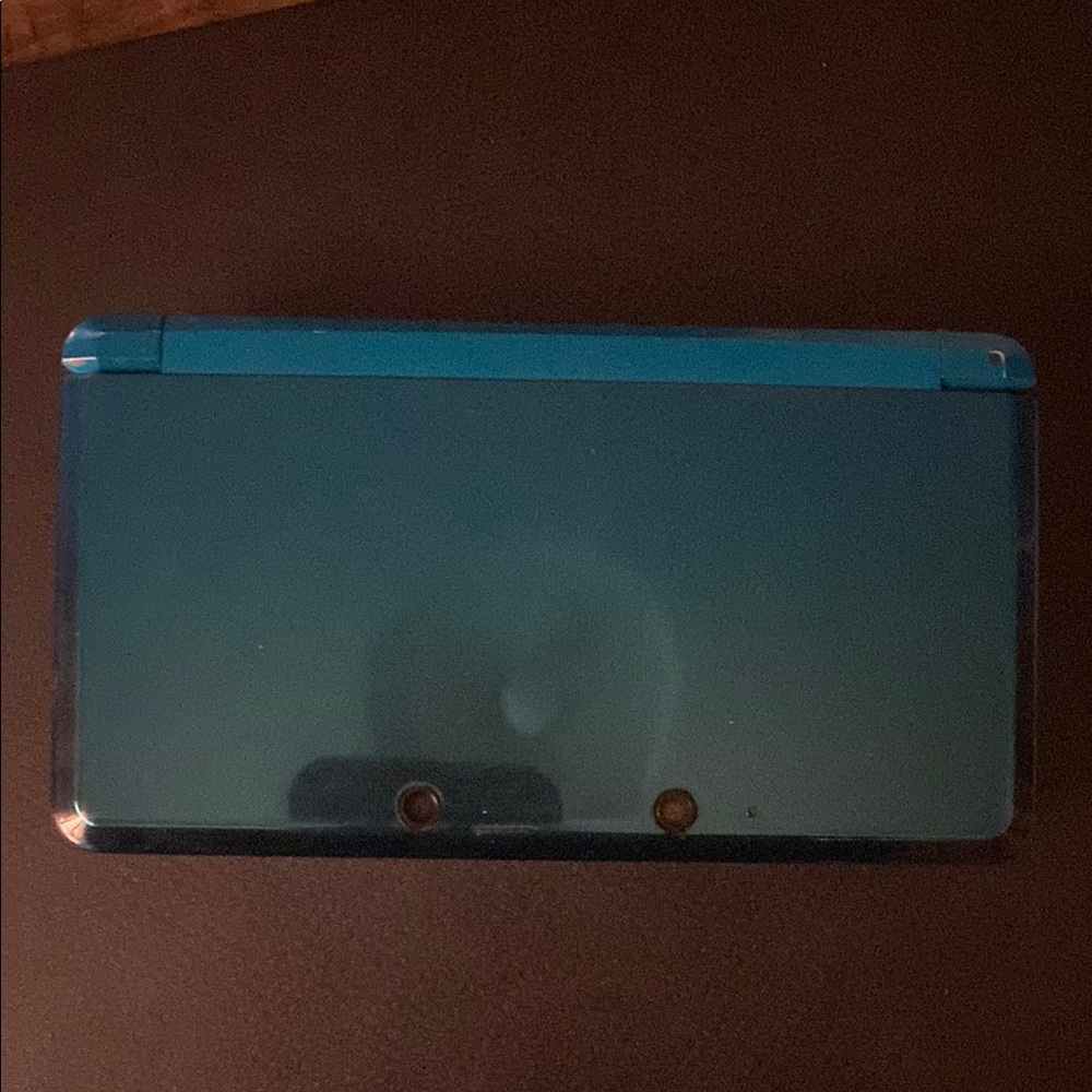 Nintendo Aqua Blue Handheld Device